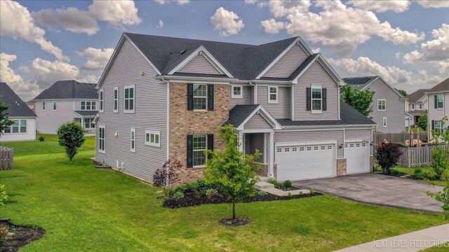 16017 S Crescent Ln, Plainfield, IL 60586 - traditional home featuring brick siding, asphalt driveway, and a residential view