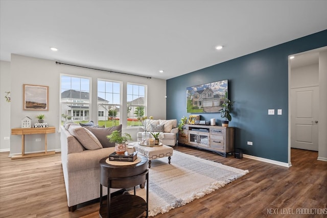 16017 S Crescent Ln, Plainfield, IL 60586 - living area featuring wood finished floors, recessed lighting, and baseboards