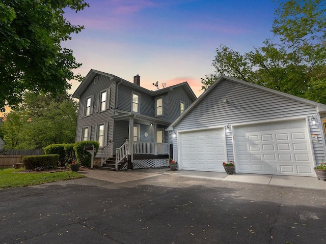 1515 W Galena Blvd, Aurora, IL 60506 - view of front of home with a chimney and a garage