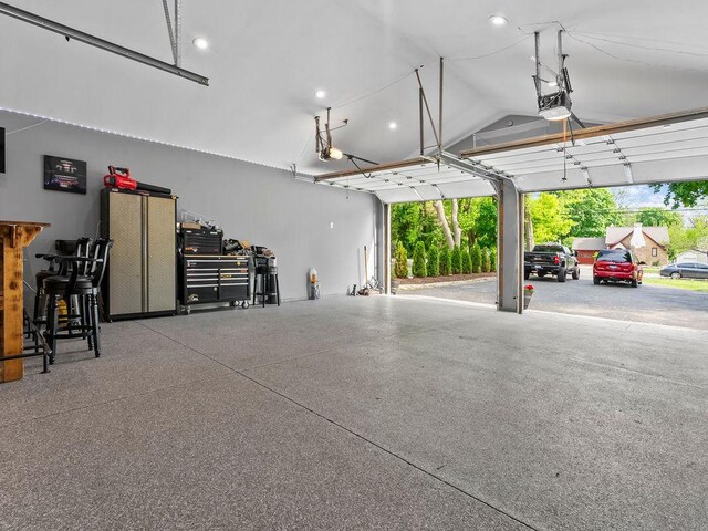 1515 W Galena Blvd, Aurora, IL 60506 - garage featuring a garage door opener and recessed lighting