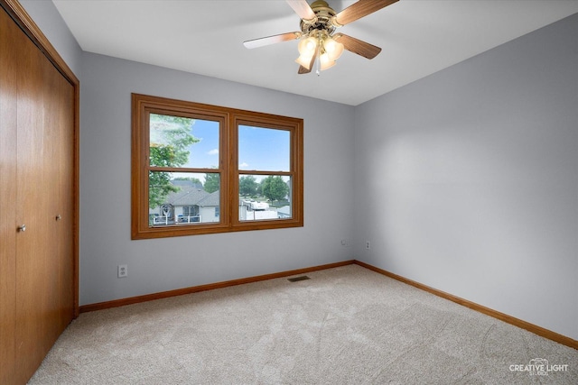 1345 William St, Sycamore, IL 60178 - unfurnished room with carpet floors and a ceiling fan