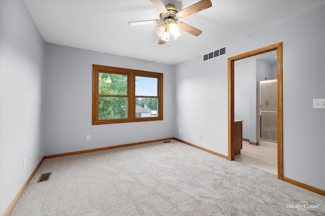 1345 William St, Sycamore, IL 60178 - carpeted spare room featuring a ceiling fan and baseboards