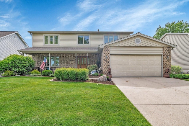 910 N Dovington Dr, Hoffman Estates, IL 60169 - traditional-style house with an attached garage, concrete driveway, a front yard, and brick siding