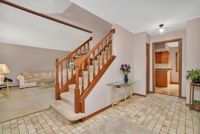 910 N Dovington Dr, Hoffman Estates, IL 60169 - stairway featuring baseboards, carpet flooring, and tile patterned flooring