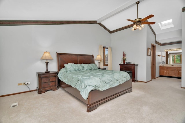 910 N Dovington Dr, Hoffman Estates, IL 60169 - bedroom featuring a skylight, light colored carpet, baseboards, ceiling fan, and connected bathroom