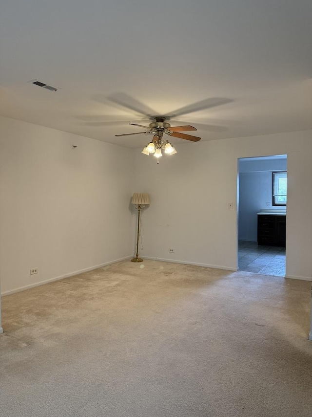 4100 Cove Ln Unit F, Glenview, IL 60025 - unfurnished room with a ceiling fan, light colored carpet, and baseboards