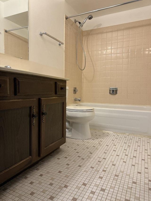 4100 Cove Ln Unit F, Glenview, IL 60025 - full bathroom featuring  shower combination, vanity, toilet, and tile patterned floors