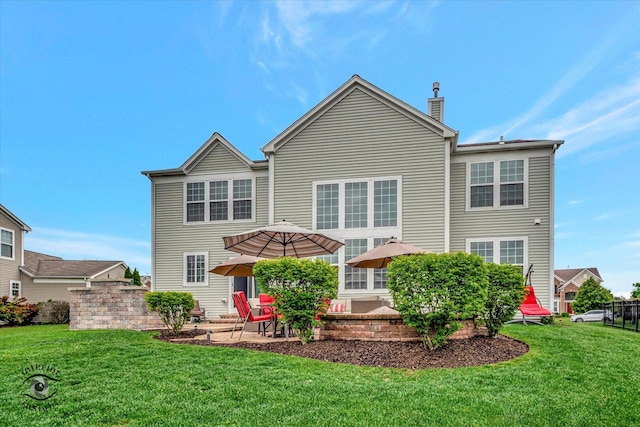 17022 S Creighton Dr, Lockport, IL 60441 - back of house featuring a chimney, a patio, and a yard