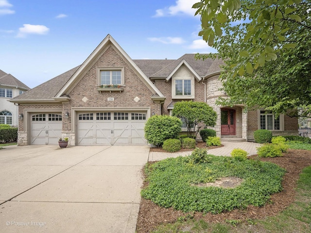 158 Los Lagos Dr, Bloomingdale, IL 60108 - traditional-style house with driveway, brick siding, and roof with shingles