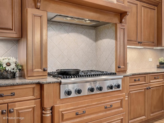 158 Los Lagos Dr, Bloomingdale, IL 60108 - kitchen featuring stainless steel gas cooktop, decorative backsplash, and brown cabinets