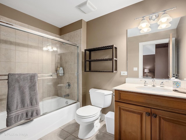 158 Los Lagos Dr, Bloomingdale, IL 60108 - full bathroom featuring vanity, toilet, enclosed tub / shower combo, and tile patterned floors