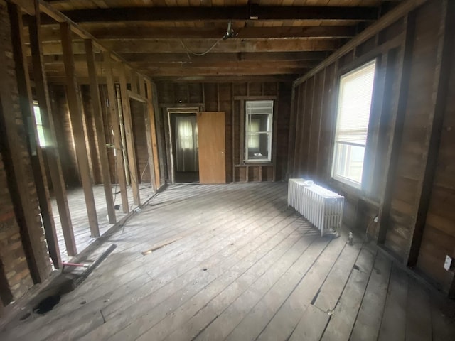 1306 Magnolia St, Rockford, IL 61104 - miscellaneous room with radiator and hardwood / wood-style floors