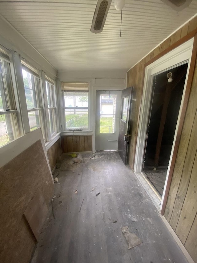 1306 Magnolia St, Rockford, IL 61104 - unfurnished sunroom with wood walls