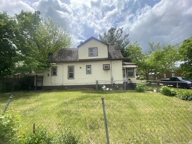 1306 Magnolia St, Rockford, IL 61104 - back of property featuring a shingled roof