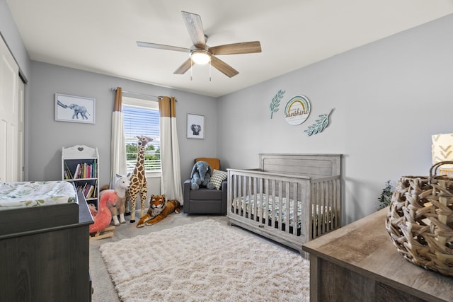 304 Turnbridge Dr, Shorewood, IL 60404 - carpeted bedroom featuring a closet, a ceiling fan, and a crib