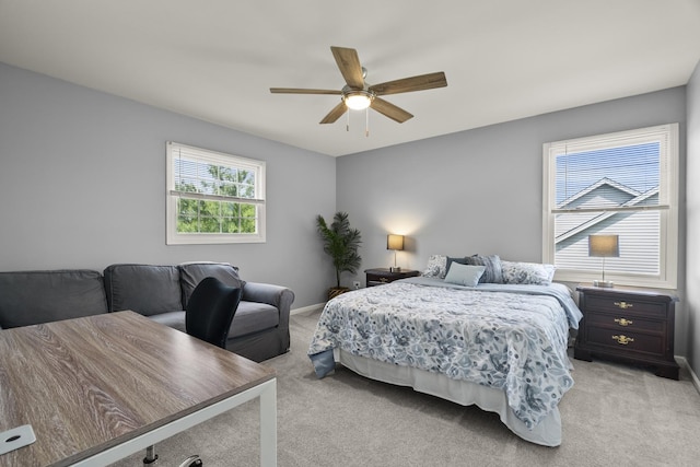 304 Turnbridge Dr, Shorewood, IL 60404 - bedroom with light carpet, baseboards, and ceiling fan