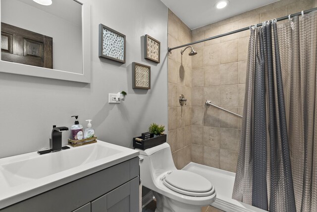 304 Turnbridge Dr, Shorewood, IL 60404 - full bath with toilet, vanity, a tile shower, and recessed lighting