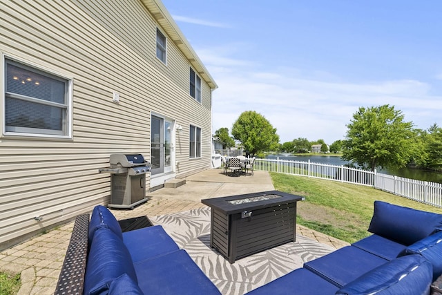304 Turnbridge Dr, Shorewood, IL 60404 - view of patio featuring area for grilling, an outdoor living space with a fire pit, a water view, and outdoor dining area