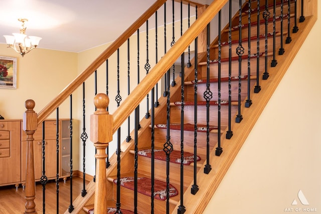 4010 Bobby Ln, Schiller Park, IL 60176 - stairs featuring a chandelier and wood finished floors
