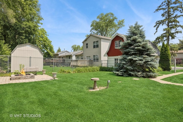 415 W N Blvd, Mchenry, IL 60051 - view of yard featuring a patio and an outbuilding