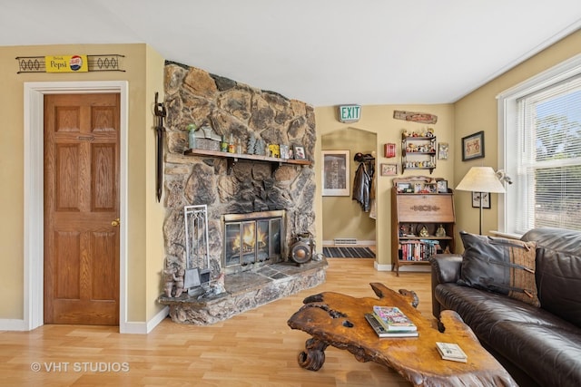 415 W N Blvd, Mchenry, IL 60051 - living area featuring wood finished floors and a stone fireplace