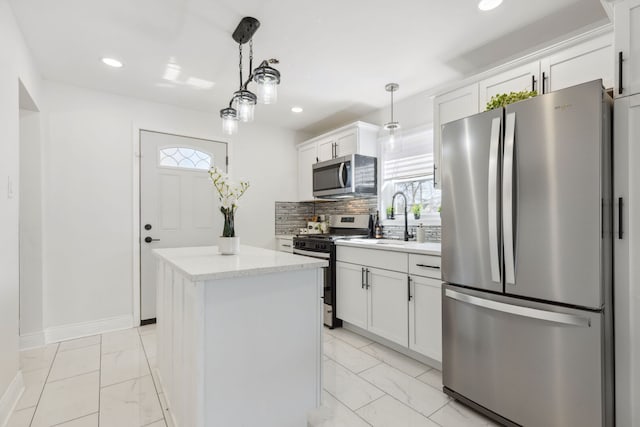 9817 S Ellis Ave, Chicago, IL 60628 - kitchen with stainless steel appliances, light marble finish floors, a center island, tasteful backsplash, and recessed lighting