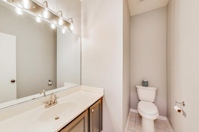 31905 Millard Cir, Warrenville, IL 60555 - half bathroom with toilet, vanity, tile patterned floors, and baseboards