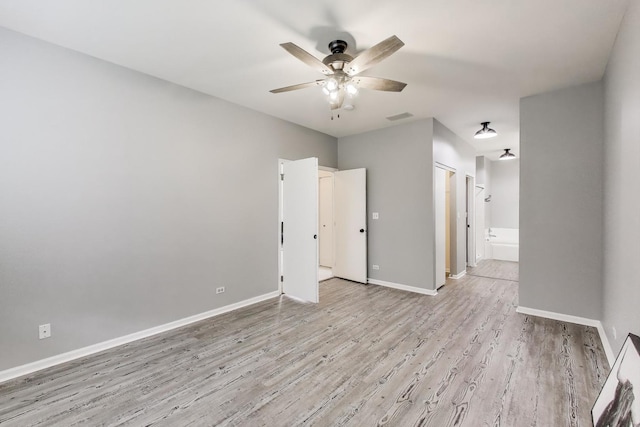 31905 Millard Cir, Warrenville, IL 60555 - spare room featuring ceiling fan, light wood finished floors, and baseboards