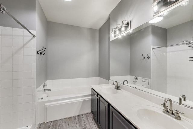 31905 Millard Cir, Warrenville, IL 60555 - full bathroom featuring a garden tub, wood finished floors, double vanity, and tiled shower