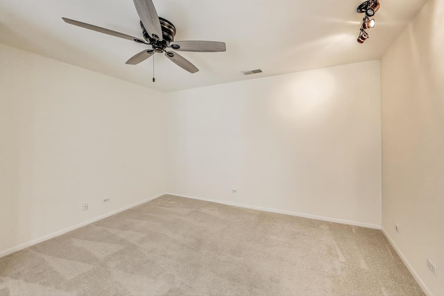 31905 Millard Cir, Warrenville, IL 60555 - spare room featuring light carpet, a ceiling fan, and baseboards