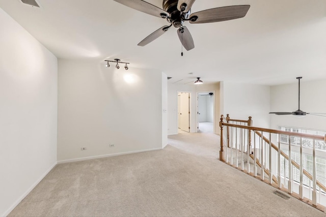 31905 Millard Cir, Warrenville, IL 60555 - empty room with a ceiling fan, light carpet, and baseboards