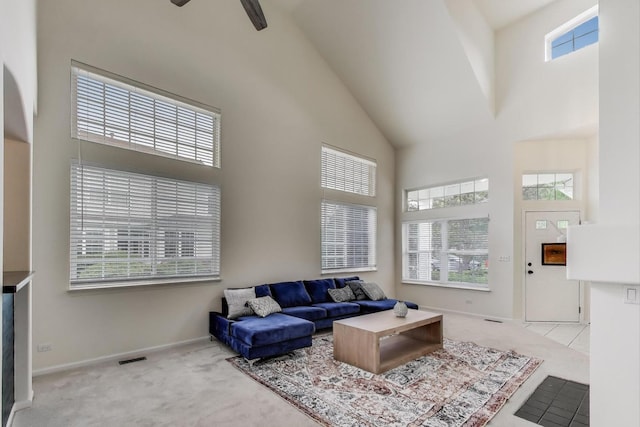 31905 Millard Cir, Warrenville, IL 60555 - living room with high vaulted ceiling, carpet flooring, baseboards, and a ceiling fan