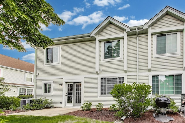 31905 Millard Cir, Warrenville, IL 60555 - rear view of property with a patio area