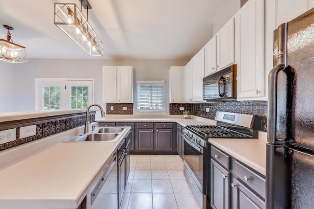 31905 Millard Cir, Warrenville, IL 60555 - kitchen featuring black appliances, a sink, decorative backsplash, light countertops, and gray cabinets
