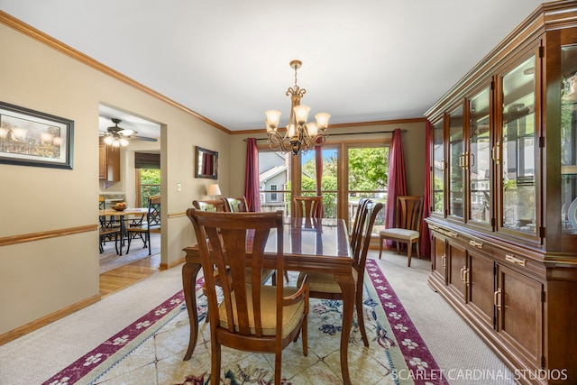 26W568 Lindsey Ave, Winfield, IL 60190 - dining area with a chandelier, healthy amount of natural light, light colored carpet, ornamental molding, and baseboards