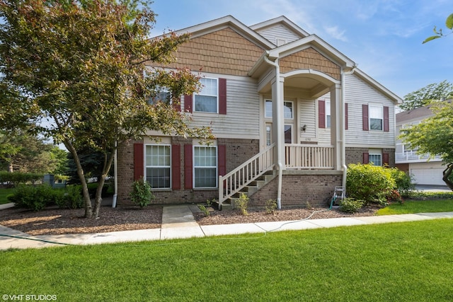 1292 Georgetown Way Unit 1292, Vernon Hills, IL 60061 - view of front of home with brick siding and a front yard