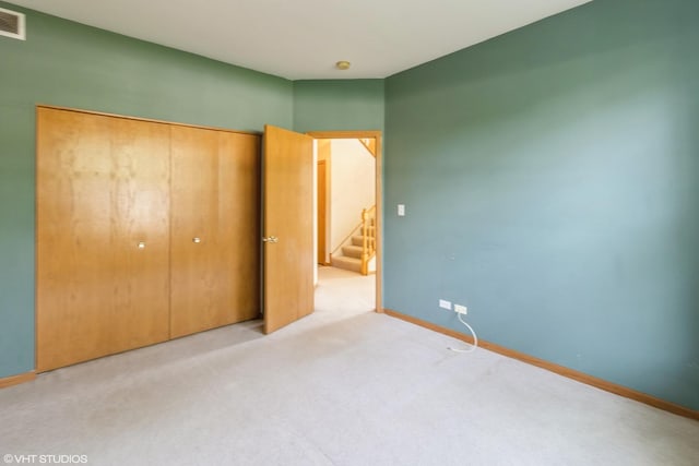 1292 Georgetown Way Unit 1292, Vernon Hills, IL 60061 - unfurnished bedroom with a closet and carpet flooring