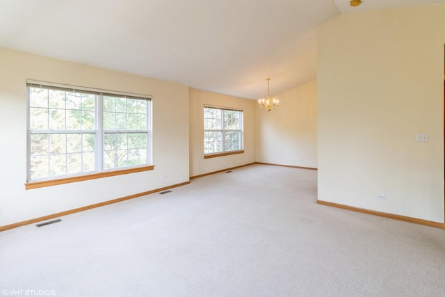 1292 Georgetown Way Unit 1292, Vernon Hills, IL 60061 - unfurnished room featuring a chandelier, light carpet, and lofted ceiling