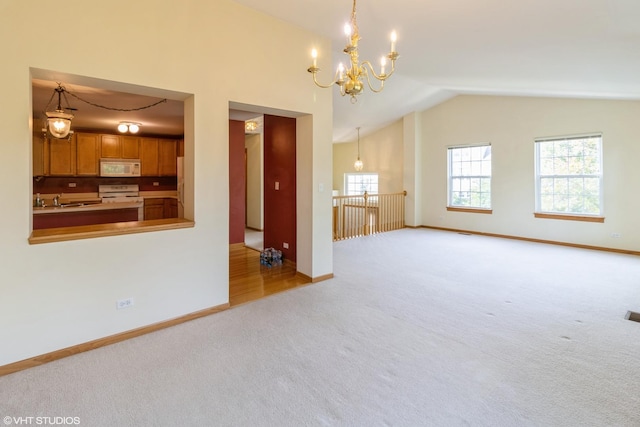 1292 Georgetown Way Unit 1292, Vernon Hills, IL 60061 - unfurnished living room featuring carpet, lofted ceiling, and a chandelier