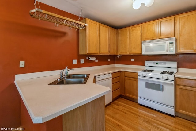 1292 Georgetown Way Unit 1292, Vernon Hills, IL 60061 - kitchen featuring white appliances, a peninsula, light wood-style floors, and light countertops