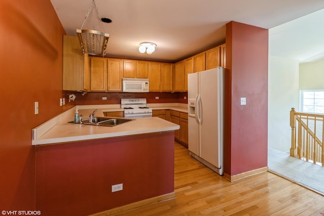 1292 Georgetown Way Unit 1292, Vernon Hills, IL 60061 - kitchen featuring white appliances, light wood-style floors, a peninsula, and light countertops