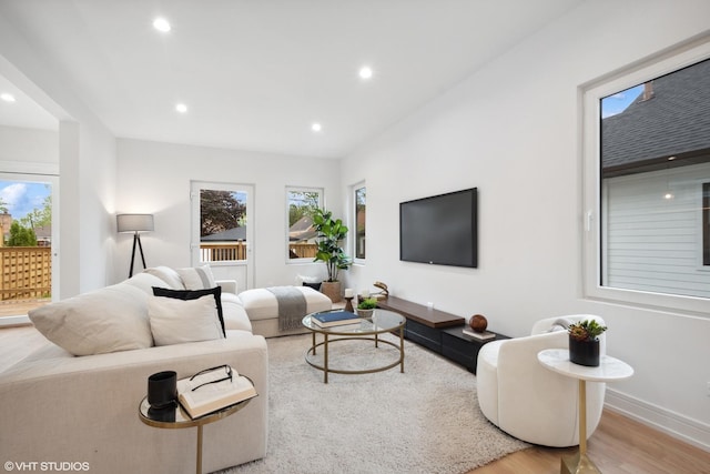 6947 N Overhill Ave, Chicago, IL 60631 - living area with healthy amount of natural light, wood finished floors, recessed lighting, and baseboards