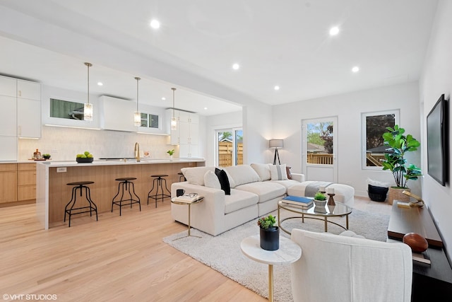 6947 N Overhill Ave, Chicago, IL 60631 - living room featuring light wood-style floors and recessed lighting