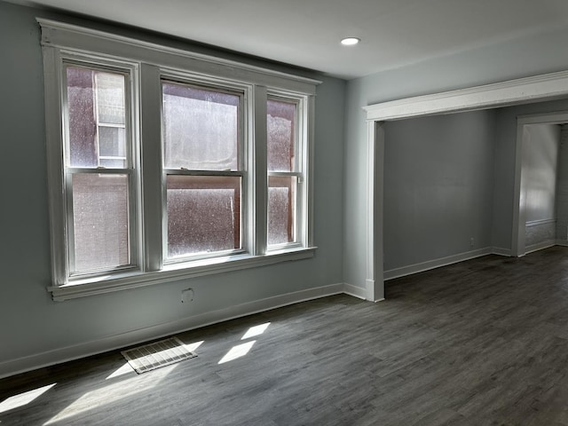 7621 S Eberhart Ave, Chicago, IL 60619 - spare room with baseboards, dark wood finished floors, and recessed lighting