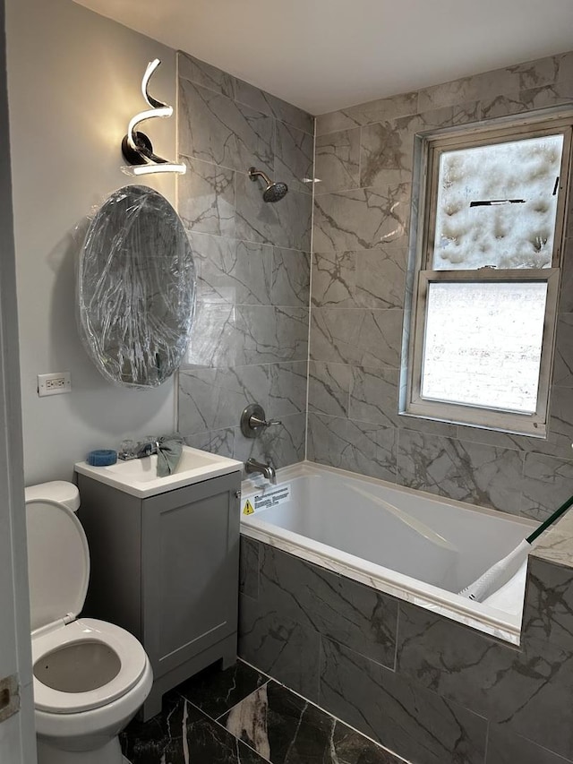 7621 S Eberhart Ave, Chicago, IL 60619 - bathroom with marble finish flooring, vanity, toilet, and a combined bath / shower with marble appearance