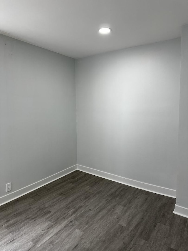 7621 S Eberhart Ave, Chicago, IL 60619 - spare room with dark wood-type flooring, baseboards, and recessed lighting