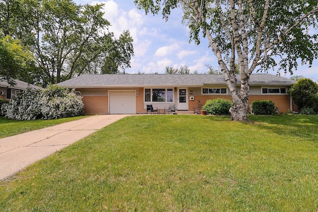 80 Flagstaff Ln, Hoffman Estates, IL 60169 - single story home with a garage, driveway, a front yard, and brick siding