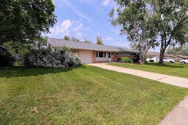 80 Flagstaff Ln, Hoffman Estates, IL 60169 - ranch-style home with an attached garage, a front yard, and driveway