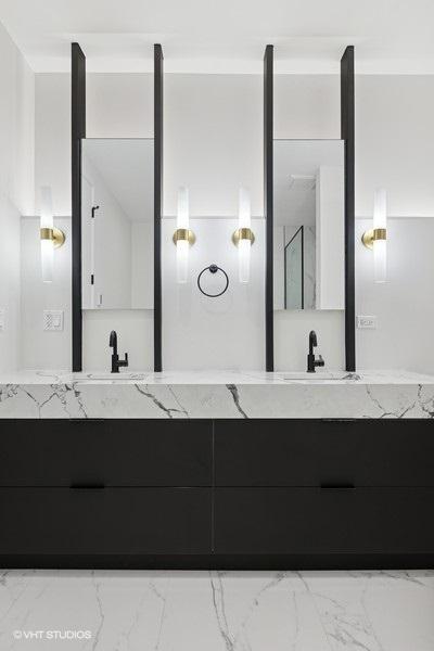 2633 N Emmett St Unit 1F, Chicago, IL 60647 - full bathroom featuring marble finish flooring and double vanity