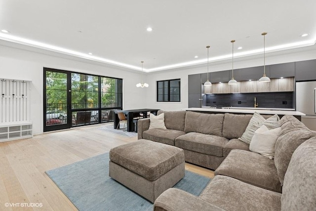 2633 N Emmett St Unit 1F, Chicago, IL 60647 - living room with a raised ceiling, light wood finished floors, and recessed lighting